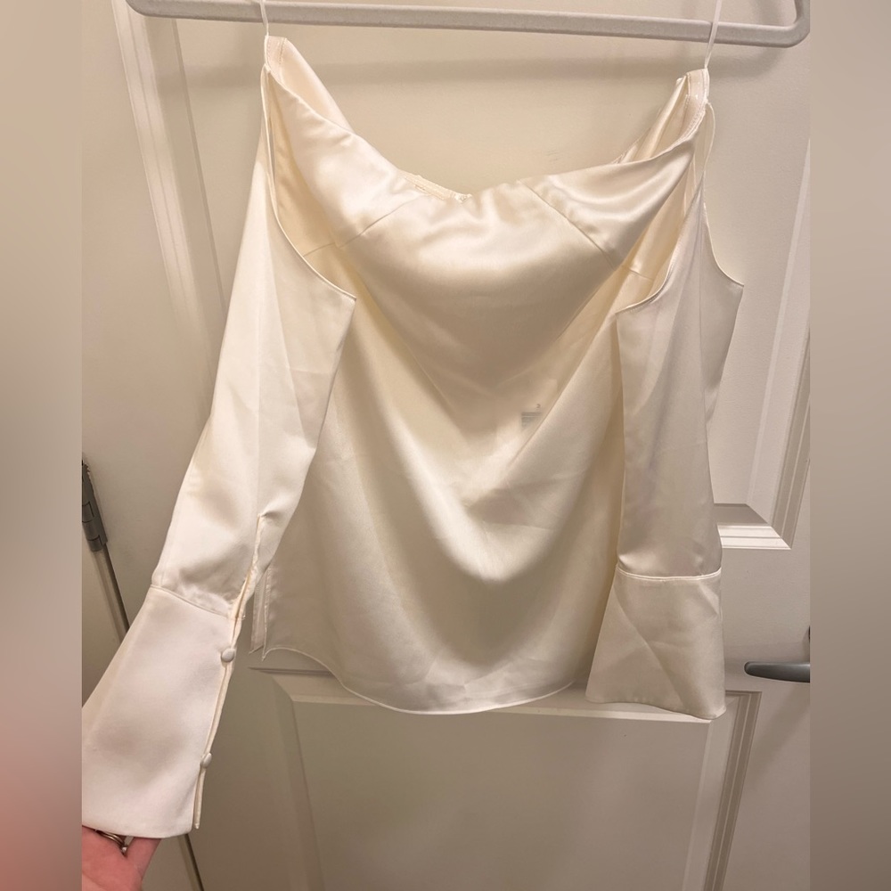 NWT Stolen Hearts ivory strapless off the shoulder top with side slits as shown